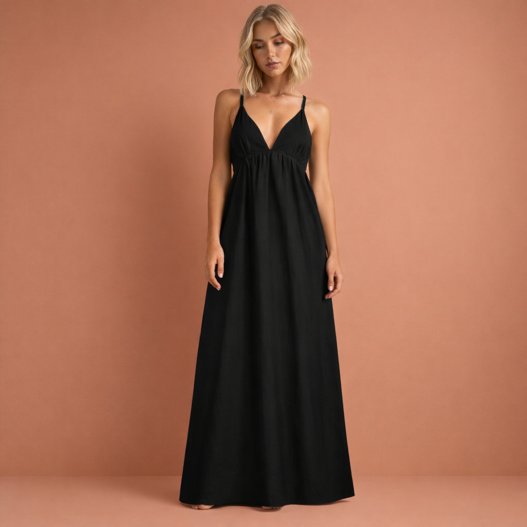 Zwarte rugloze maxi-jurk voor dames met cut-out ontwerp, perfect voor zomerse gelegenheden en vakanties.